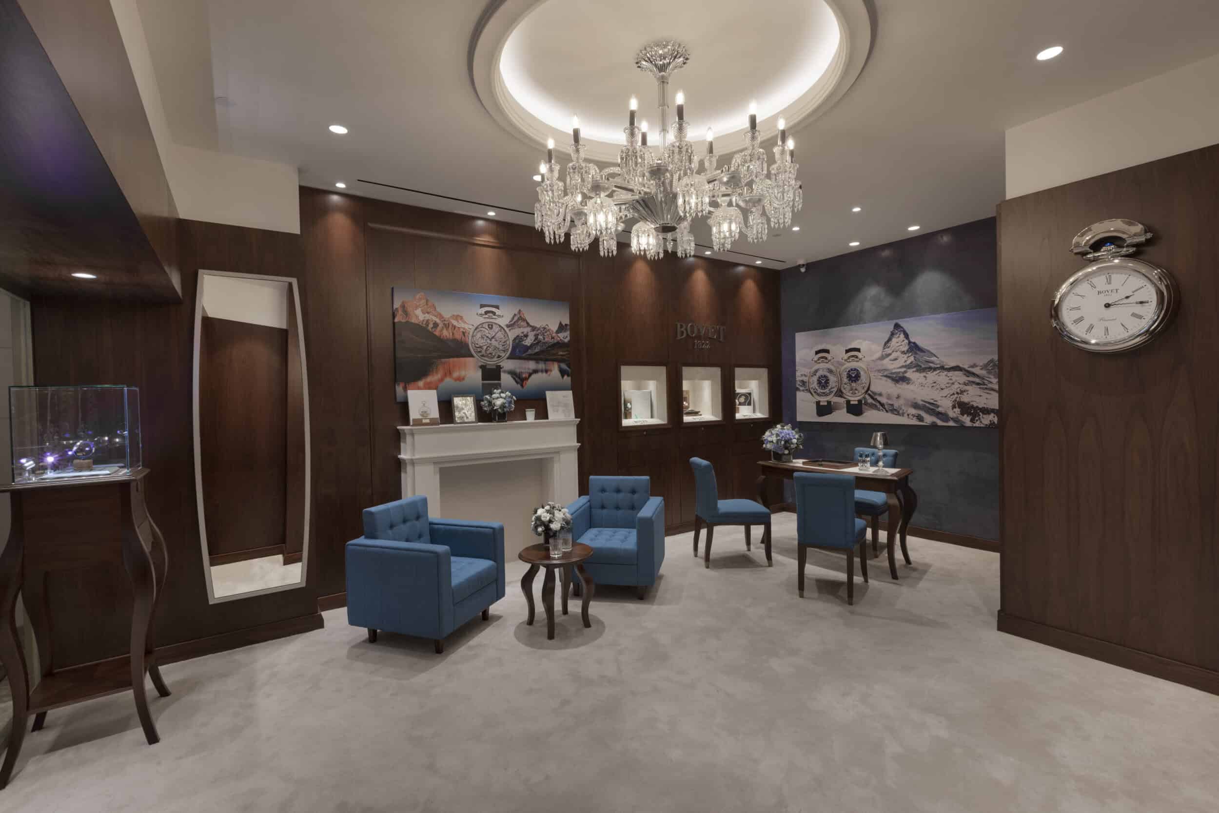 Elegant Bovet showroom interior showcasing luxurious timepieces in a sophisticated setting with plus.