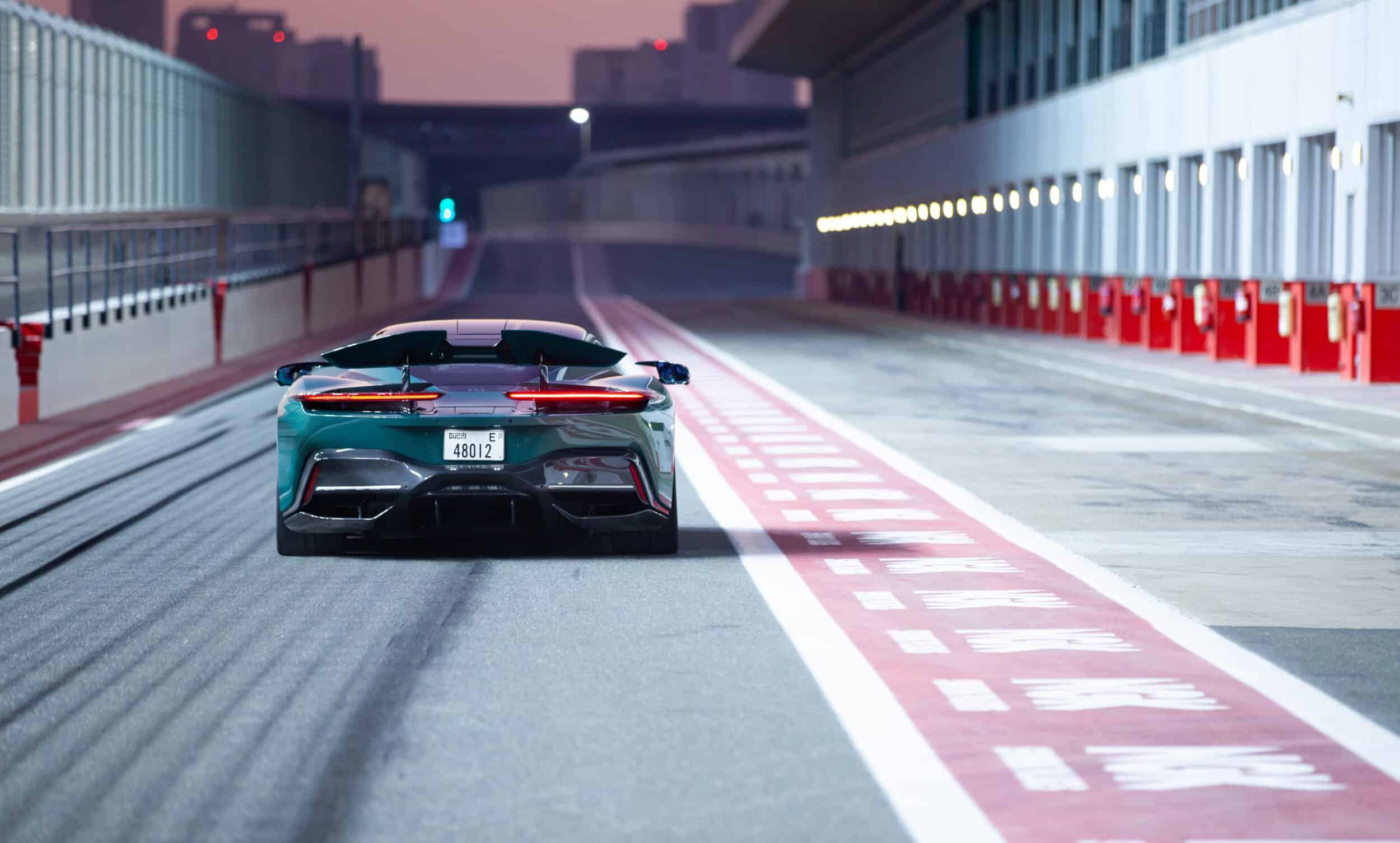 High-performance sports car on race track with Bovet branding, emphasizing precision and luxury.