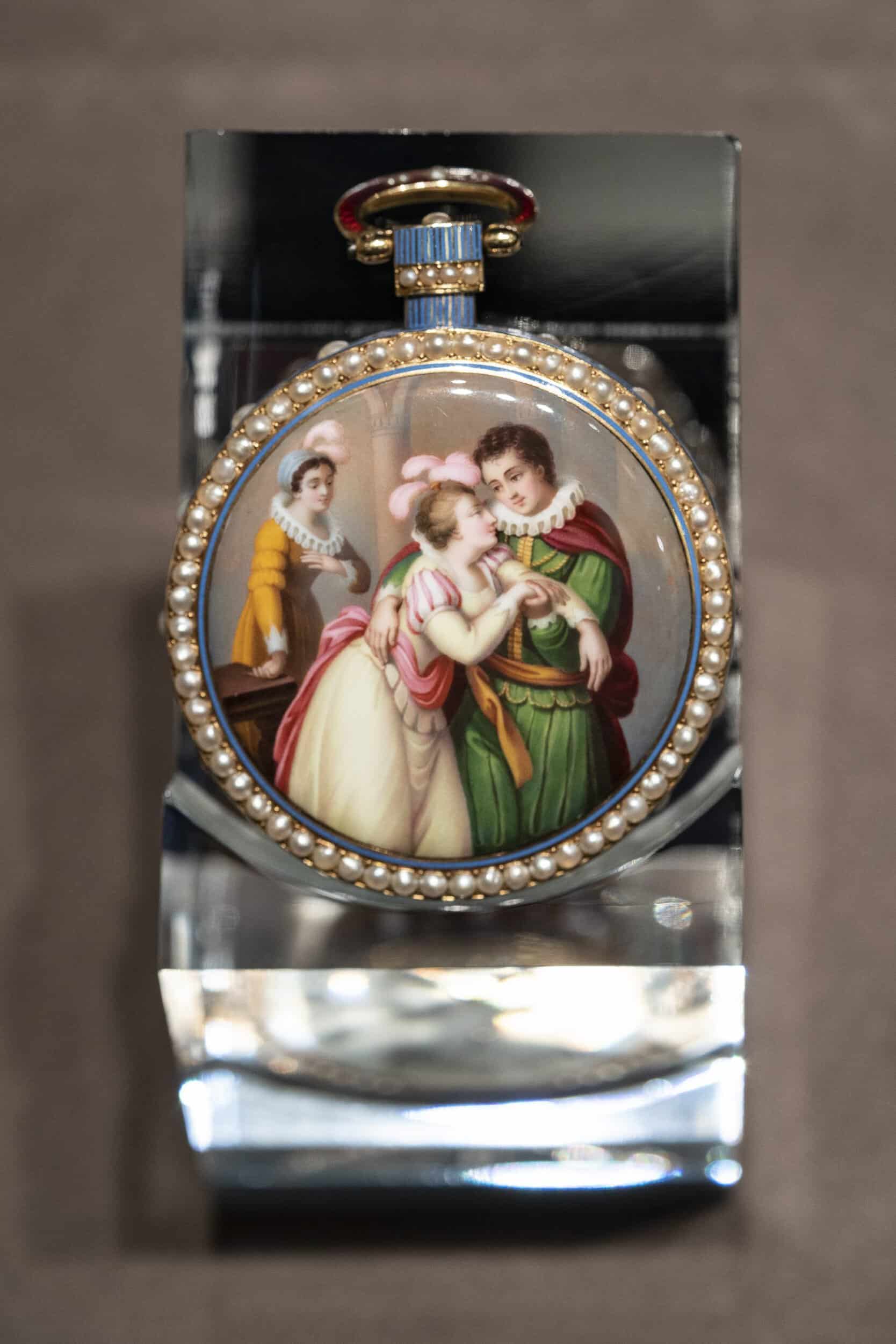 A stunning Bovet timepiece featuring intricate enamel artwork and a pearl-encrusted bezel, exemplify.